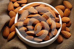 Nutty grace almonds arranged on eco canvas napkin, nature inspired aesthetics