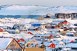 Nuuk city covered in snow with sea and mountains
