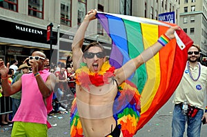 NYC: Exuberant Man with Rainbow Flag