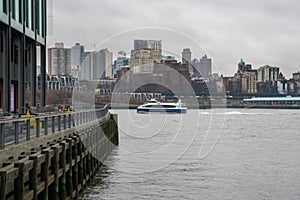 NYC Ferry Moving Across the East River
