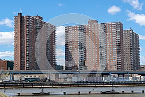 NYC housing projects on 145th Street and Malcolm X Boulevard in Harlem, seen from the Bronx, New York City, USA