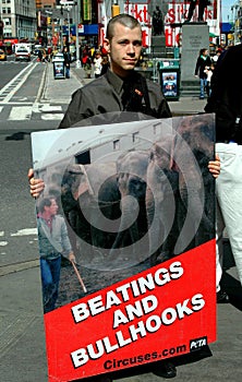 NYC: Man with PETA Sign Protesting Cruelty to Animals