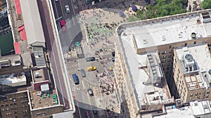 NYC Manhattan busy street traffic rooftop sun bathers