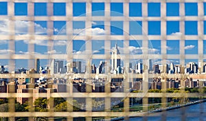 NYC Panorama Downtown Skyline Background Through a Fence