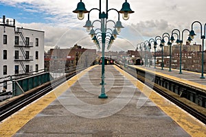 NYC subway platform looking at arriving train