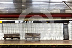 NYC subway station and bench