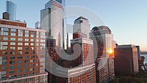 NYC view from above twilight sky. Forwards fly above NYC street between modern buildings. Manhattan, NYC aerial view