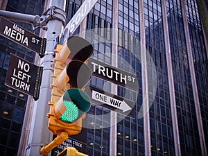NYC Wall street yellow traffic green light black pointer guide O