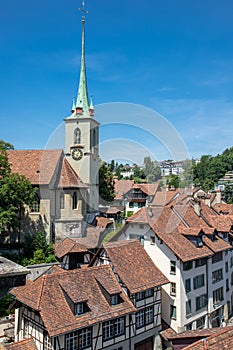 Nydegg Church Nydeggkirche and houses with tiled rooftops, Bern Switzerland