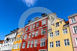 Nyhavn district in Copenhagen, Denmark. City center panoramic view of colorful houses.