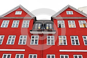 Nyhavn district in Copenhagen, Denmark. City center panoramic view of colorful houses.