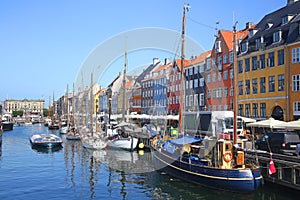 Nyhavn - the Historic waterfront with wooden ships, canal, colourful buildings and entertainment, Copenhagen, Denmark