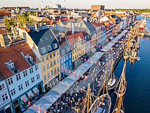 Nyhavn New Harbour canal and entertainment district in Copenhagen, Denmark. The canal harbours many historical wooden