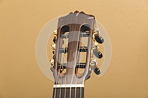 A nylon string guitar's headstock