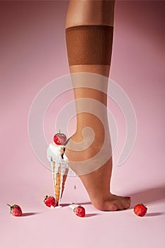 Nylons, stay-up, tights, hosiery, hose, pantyhose socks summer collection on pink background as a heel creative dessert ice cream photo