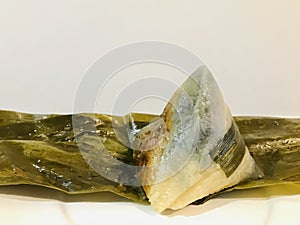 Nyonya Chang, glutinous rice dumpling with pandan leaves. copy space.