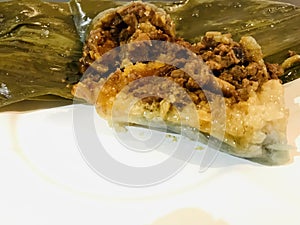 Nyonya Chang, glutinous rice dumpling with pandan leaves. details. Melaka food concept.