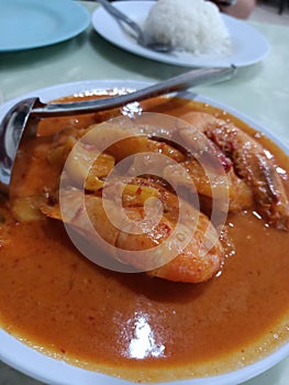 Nyonya style prawn. Curry creamy pineapple gravy