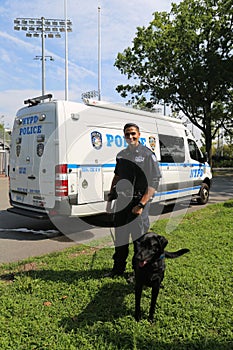 NYPD counter terrorism bureau K-9 police officer and K-9 dog providing security at National Tennis Center during US Open 2017