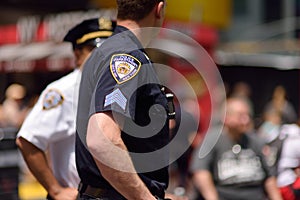 NYPD officers stands guard in Times Square, Manhattan, New York, USA