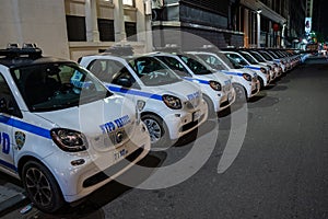 NYPD police cars near Times Square at night, Manhattan