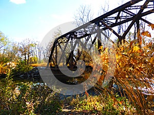 NYS train trestle bridge over Salmon Creek in fall colors