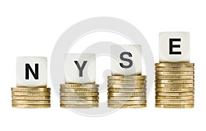 NYSE New York Stock Exchange Letters on Gold Coin Stacks photo