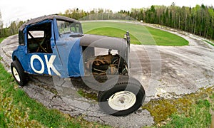 O.K. Old Race Car at a Vintage Speedway Race Track photo