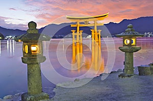 O-Torii great floating gate on Miyajima island in Japan at sunset