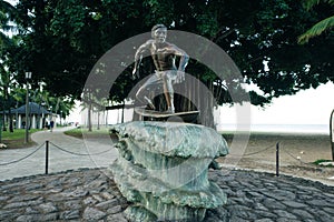 Oahu, USA - December 2020 Surf statue on Queen's Beach area of downtown Waikiki Honolulu, Oahu