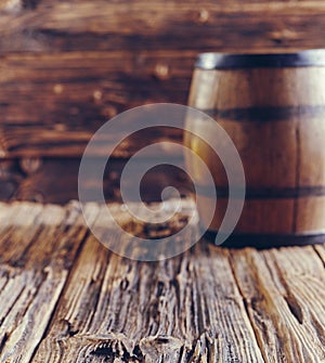 Oak barrel on old wooden table