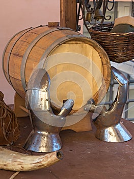 Oak Barrel on Wooden Table with Hand Iron Armors