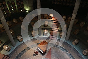 Oak Barrels and Piano in Vineyard Wharehouse