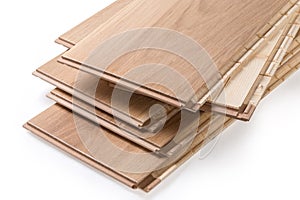 Oak engineered wood flooring boards stack, fragment of end parts