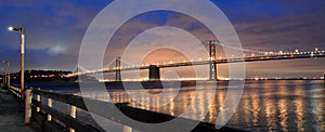 Oakland Bay Bridge lights in dusk in San Francisco, California