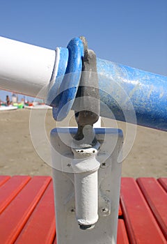 Oar and oarlock on the beach photo