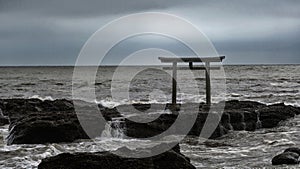 Oaraii Isosaki shrine Torii in the sea with storm Ibaraki