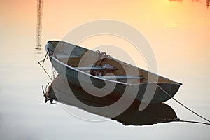 Oared boat on a lake bank
