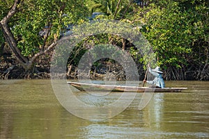 Oarsman on the river, Thailand.