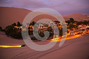 Oasis of Huacachina at night, Ica region, Peru. photo