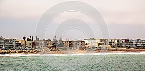 Ð¡oastline panorama with houses in background, Swakopmund German