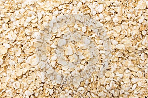 Oat cereal flake. Closeup of grains, background use.