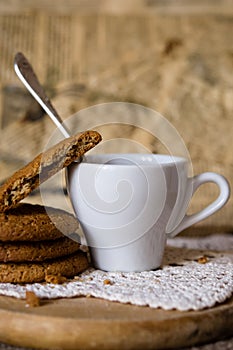 Oat cookies biscuits with cup of coffee