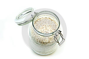 Oat flakes stored inside the closable glass