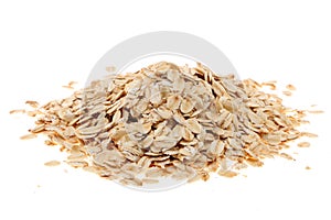 Oat flakes, uncooked oats in bowl with poon and wheat ears on white background. Concept of healthy eating, vegan food, healthy foo