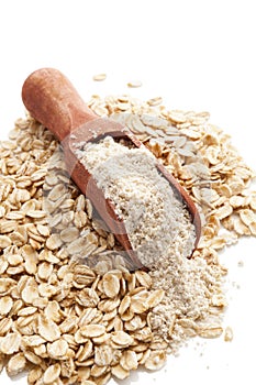 Oat flour in spoon.