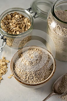 Oat flour and whole oats. Gluten free flour, oats, home baking.