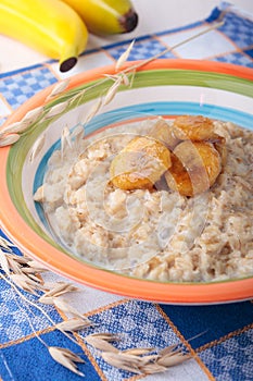 Oat meal with caramelized banana on plate