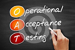 OAT Operational Acceptance Testing, technology business concept on blackboard