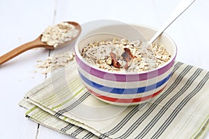 Oatflakes in bowl photo